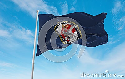 official flag of Maritime Security Agency Indonesia at cloudy sky background on sunset, panoramic view. Indonesian travel and Cartoon Illustration