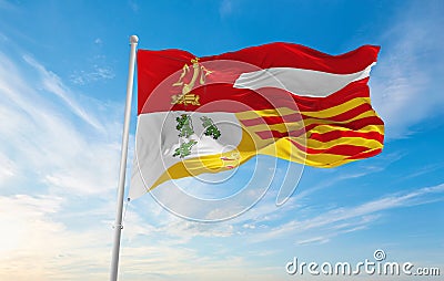 official flag of Province of Liege , Belgium at cloudy sky background on sunset, panoramic view. Belgian travel and patriot Cartoon Illustration
