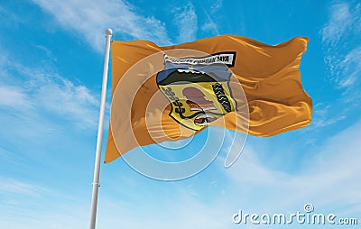 official flag of Puncak Jaya Regency Indonesia at cloudy sky background on sunset, panoramic view. Indonesian travel and patriot Cartoon Illustration