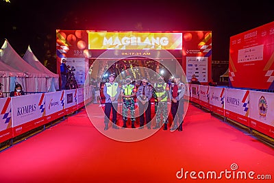 The official security team taking pictures infront of the start line, Borobudur Marathon 2022 Editorial Stock Photo