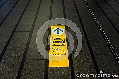 Official taxi stand in Schiphol International airport Stock Photo