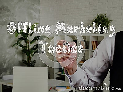 Offline Marketing Tactics phrase on the piece of paper Stock Photo