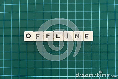 Offline word made of square letter word on green square mat background Stock Photo