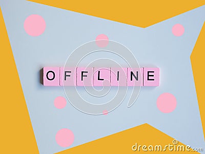 Offline word wooden cubes on colorful background. Stock Photo