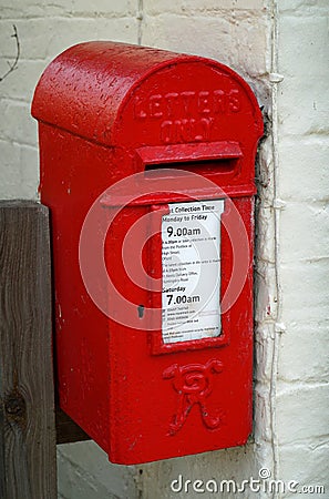 Very small Royal Mail post box still in use. Editorial Stock Photo