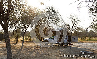 Offroad 4x4 vehicle with tent in the roof Stock Photo