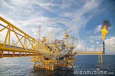 Offshore construction platform for production oil and gas, Oil and gas industry and hard work, Production platform and operation Stock Photo