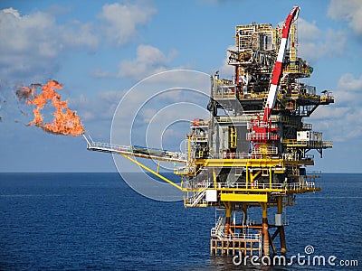 Offshore construction platform for production oil and gas, Oil and gas industry and hard work, Production platform and operation Stock Photo