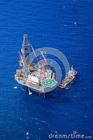 The offshore drilling oil rig top view from aircraft. Stock Photo