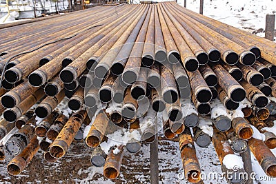 Offshore Industry oil and gas production petroleum pipeline. Downhole drilling rig. Laying the pipe on the deck. View of the shell Stock Photo