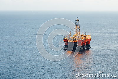 Offshore oil and gas platform with illumination Stock Photo