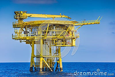 Offshore oil and gas wellhea remote platform produced raw gas and crude oil and sent to central processing platform Stock Photo