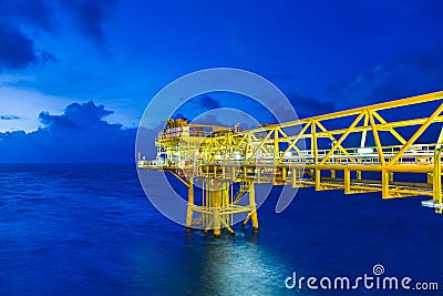 Offshore oil and gas wellhead remote platform produced crude oil and natural gas for sent to onshore refinery. Stock Photo