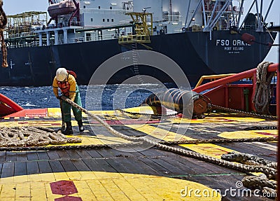 Offshore vessel crew working on deck Editorial Stock Photo