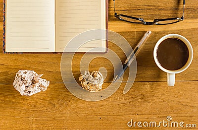 Ofice wood table notepad, magnifying glass Stock Photo