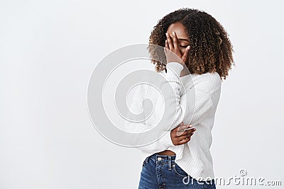 Oh god why me. Portrait tired exhausted emotive african-american curly-haired woman facepalming press palm face close Stock Photo