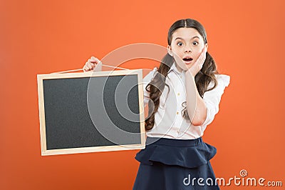 Oh my god. surprised pupil in school uniform. copy space. commercial marketing conept. business school advert. new Stock Photo