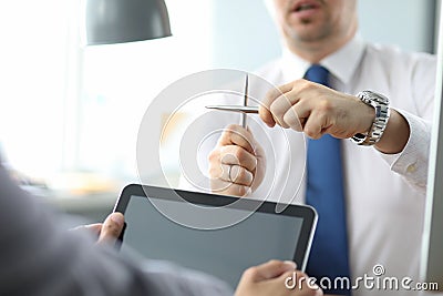 Oh no. Close up photo of sad upset unsatisfied marketer financier economist. He crossing two pens looking at a Stock Photo