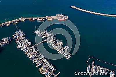 Oh the places youll go in your boat. High angle shot of boats at a seaside harbour. Stock Photo