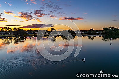 Ohmas Bay Sunset with Clouds and Reflections Stock Photo