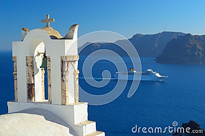 Oia church tower and cruise ship, Santorini, Cyclades, Greece Stock Photo