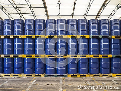 Oil barrels or chemical drums stacked up Stock Photo