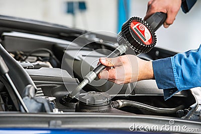 Oil change with an electronic dosage system Stock Photo