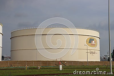 Oil and chemical storage tanks of Vopak in Rotterdam harbor Editorial Stock Photo