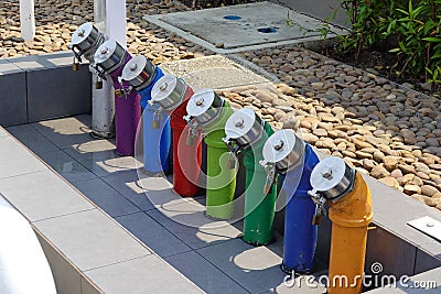 Oil distribution pipe in service station. Colorful pipe for classify of fuel. Stock Photo