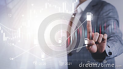 Oil energy graph of the world market, impact on the economy concept, Businessman touch chart with the indicator on the oil price s Stock Photo