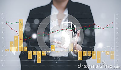 Oil energy graph of the world market, impact on the economy concept,Businesswoman touch chart with the indicator on the oil price Stock Photo