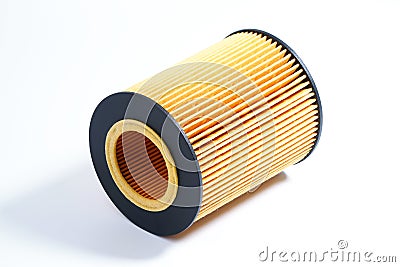 The oil filter lies on a white background. Stock Photo