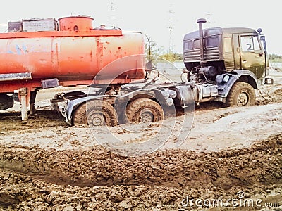 stuck truck in mud on a dirt road Editorial Stock Photo