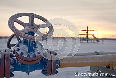 Oil, gas industry. Group wellheads and valve armature Stock Photo