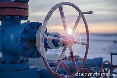 Oil, gas industry. Group wellheads and valve armature Stock Photo