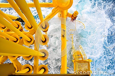 Oil and Gas Producing Slots at Offshore Platform, The platform on bad weather condition.,Oil and Gas Industry. Stock Photo