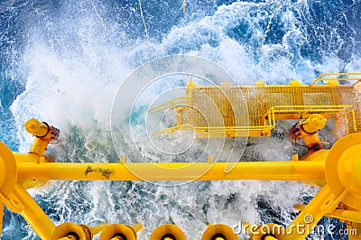 Oil and Gas Producing Slots at Offshore Platform, The platform on bad weather condition.,Oil and Gas Industry. Stock Photo