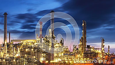 Oil and gas refinery at night Stock Photo