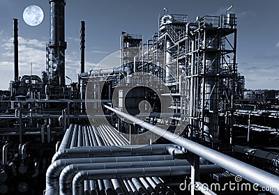 Oil and gas refinery at night Stock Photo
