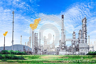Oil and gas refinery plant with with flare stack on blue sky background Stock Photo
