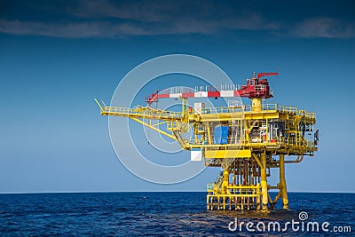 Oil and gas remote wellhead platform produced gas and crud oil and sent to central processing platform Stock Photo