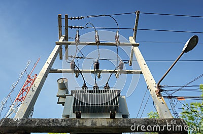 Oil immersed distribution transformer on platform Stock Photo