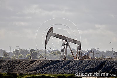 Oil jack drilling in California wetlands Stock Photo