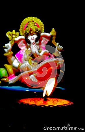 oil lamp,diwali lamp ,ganpati bappa,diwali lamp black background,lamp lit,hindu god and oil lamp Stock Photo