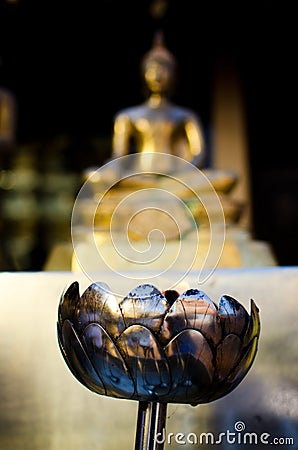 Oil lamp with light in Buddha temple Stock Photo