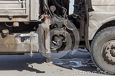 Oil and mud contaminated truck engine and transmission Stock Photo