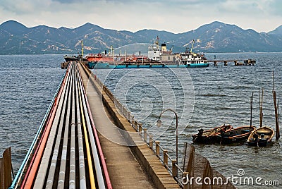 Oil pipeline and tanker Stock Photo