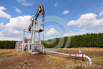 Oil pump jack Stock Photo