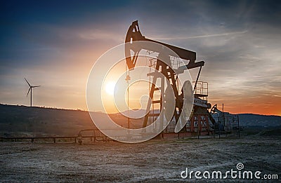 Oil pump on sunset Stock Photo