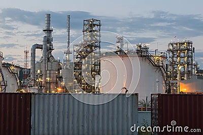 Oil Refinery factory in evening, Petroleum, petrochemical plant Stock Photo